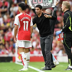 Arsenal Manager Mikel Arteta Conferencing with Gabriel Martinelli during Arsenal vs Nottingham Forest (2023-24)