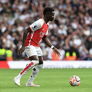 Arsenal's Bukayo Saka Faces Off Against Tottenham in the 2023-24 Premier League Battle