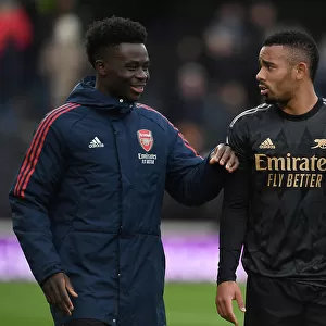 Arsenal's Bukayo Saka and Gabriel Jesus Celebrate Victory over Fulham in Premier League