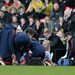 Arsenal's Leah Williamson Receives Medical Attention During Manchester United vs Arsenal Women's Super League Match