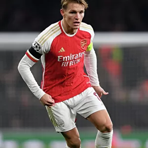 Arsenal's Martin Odegaard in Action against RC Lens in 2023-24 UEFA Champions League at Emirates Stadium