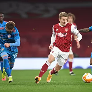 Arsenal's Martin Odegaard in Europa League Action vs Olympiacos (Behind Closed Doors)