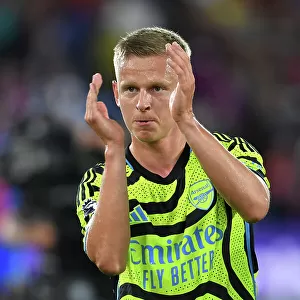 Arsenal's Zinchenko Celebrates with Fans: Crystal Palace Victory in 2023-24 Premier League