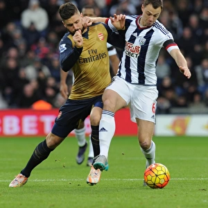 Giroud vs Evans: A Footballing Battle in the Premier League Clash between West Brom and Arsenal