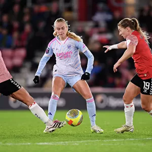 Intense Battle for Possession: Arsenal vs. Southampton - FA Women's Continental Tyres League Cup Clash