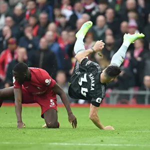 Intense Midfield Battle: Xhaka vs. Liverpool, Premier League 2022-23 - Arsenal's Granit Xhaka Faces Off Against Liverpool's Midfield in Epic Showdown