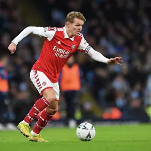 Martin Odegaard Faces Manchester City in FA Cup Clash