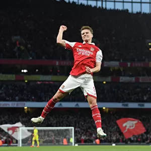 Martin Odegaard Scores the Opener: Arsenal Leads Chelsea in Thrilling 2022-23 Premier League Clash
