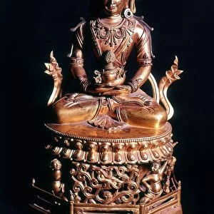 Amitaba Buddha in his manifestation of Boundless Life sitting holding a vessel containing