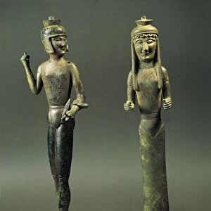Bronze statuettes representing warrior and woman, possibly base for furniture, 550 B. C. from Brolio, Val di Chiana, Tuscany, Italy