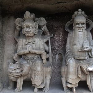 China, Chongqing, Dazu County, stone sculptures of Bodhisattva Manjushri riding lion and Samantabhadra riding elephant