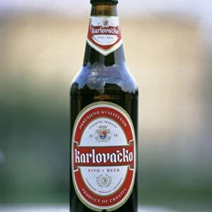 Croatia, bottle containing Karlovacko beer