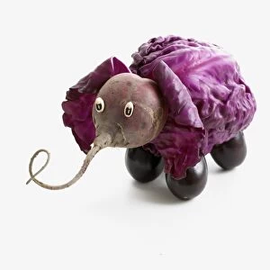 Elephant made from raw red cabbage, beetroot and aubergines