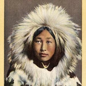 Eskimo Girl Wearing Parka. ca. 1942, Alaska, USA, 38- Obleka an Eskimo Glamour Girl in Native Costume. Showing the Parka Hood