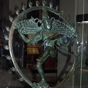 Hindu god Shiva appears as Nataraja (lord of the dance) dancing in a ring of fire