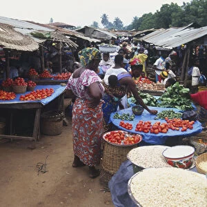 Market Stalls selling Vegetables, Dried Fish and Corn in Africa