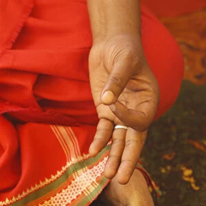 Sadhvi (female sadhu) doing a mudra