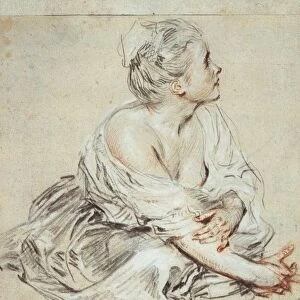 Seated woman turning to the right. Drawing in black and red chalk. Jean-Antoine Watteau
