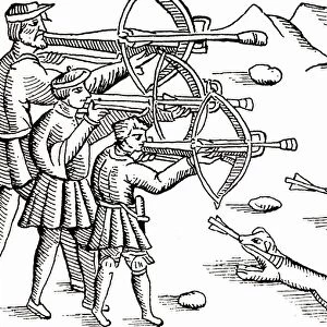 Shooting crossbows at the butts. At one time archery practice was compulsory for adult males
