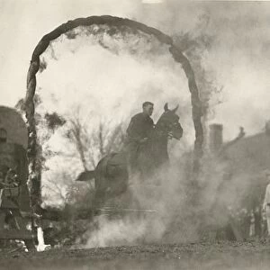 Soldier on Horseback Jumping Through Flaming Arch