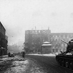 A soviet tank and troops of the first ukrainian front on a street in gleiwitz in german silesia on the day it was captured by the red army, february 1945