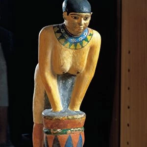 Statue depicting woman filtering barley to make beer