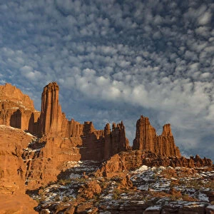 Fisher Towers with snow and clouds, near Castle Valley, Utah, USA