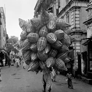 Man carrying baskets