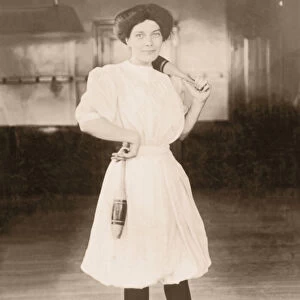 Young woman holding exercise pins (B&W sepia tone)