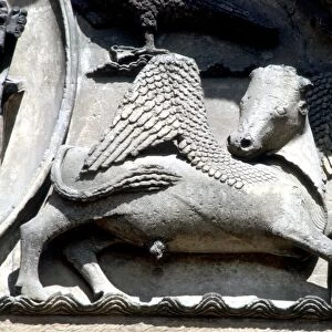 Ast. Sites Chartres The bull of Luke on the tympanum of the Royal Portal with the