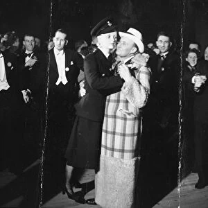 Max Miller, looking quite at home in the arms of the law, pictured dancing with