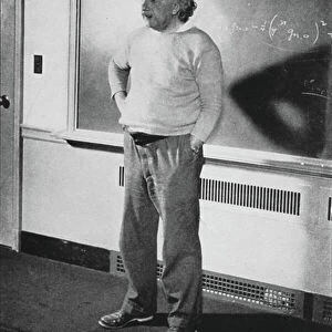 Albert Einstein in his study at Institute of Advanced Study, Princeton, USA, 1940 (b/w photo)