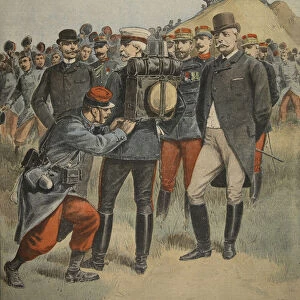 With the army manoeuvres: The duke of Connaught testing the bag of a soldier