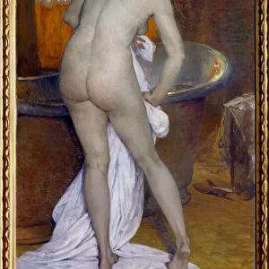 The bath. Scene in a bathroom: A woman out of the bathtub wipes her naked body with a