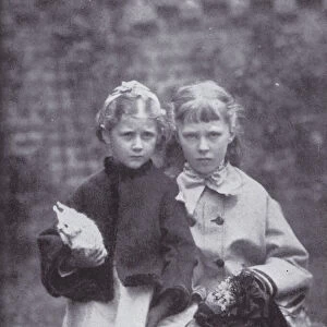 Beatrix Potter, with toy rabbit, and one of her cousins (b / w photo)