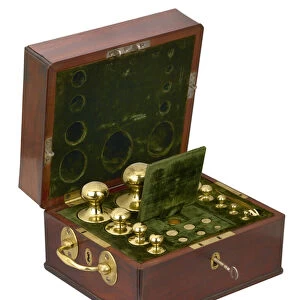 A box of standard weights for silver coins, 1774 (brass weights in wooden box)