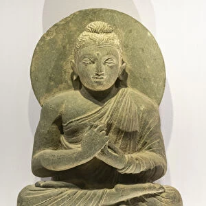 Buddha making the gesture of the wheel of the Law in motion