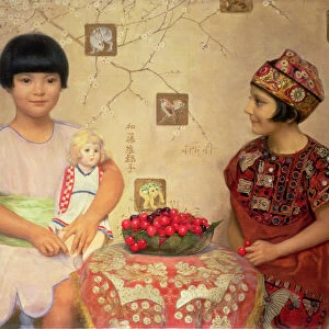 Two children with a bowl of cherries