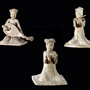 Chinese art: statuettes of lute and flute musicians sitting in terracotta