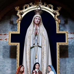 Church of Mercy. Our Lady of Fatima with Lucia dos Santos and her cousins Francisco