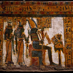 The divinites Isis and Nephtys worshipping Osiris. 1085-935 BC (painted wood)