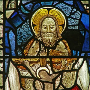 The East window (Ew) depicting a composite panel of the Trinity (stained glass)
