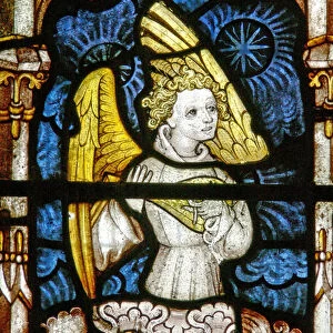 The East window (Ew) depicting a musician angel (stained glass)