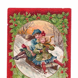 Edwardian Christmas postcard of two girls sliding down the snow in a cart, c
