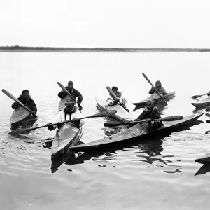 Eskimos in kayaks, c. 1920 (b / w photo)