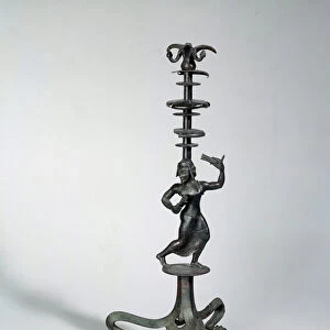 Etruscan art: bronze candelabre representing a rattlesnake dancer. 5th century BC