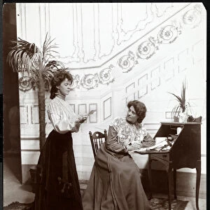 Two female stage hands on a stage set, acting, New York, 1904 (silver gelatin print)