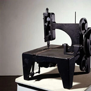 First model of Singer sewing machine. mid 19th century