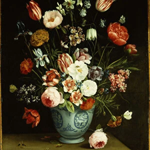 Flowers in a blue and white porcelain vase, with moths and other insects on a ledge