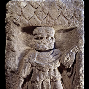 Gallo-Roman art: tricephal divinites or Mercury has three heads. Relief on stone